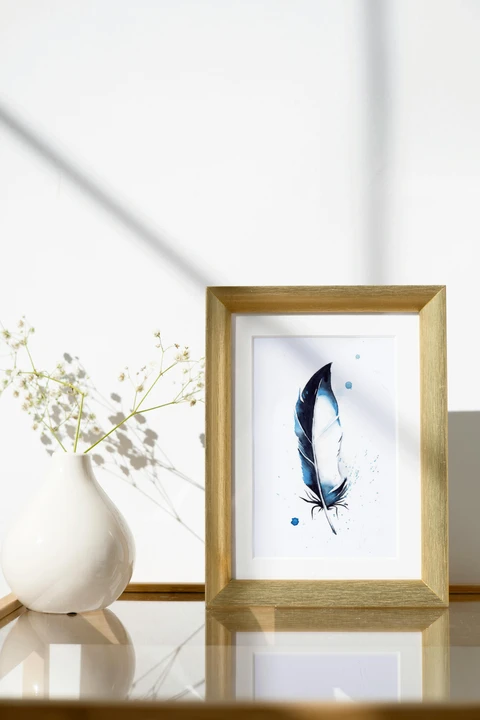Image of a feather watercolor painting by Shayna Larsen, originals & prints available