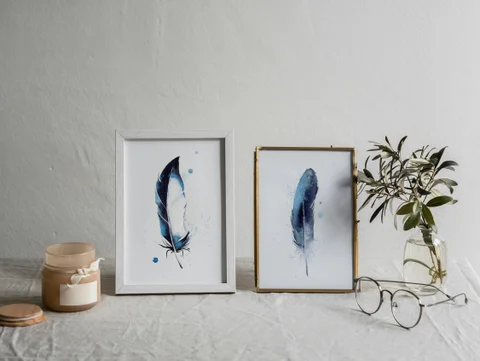Image of a feather watercolor painting by Shayna Larsen, originals & prints available