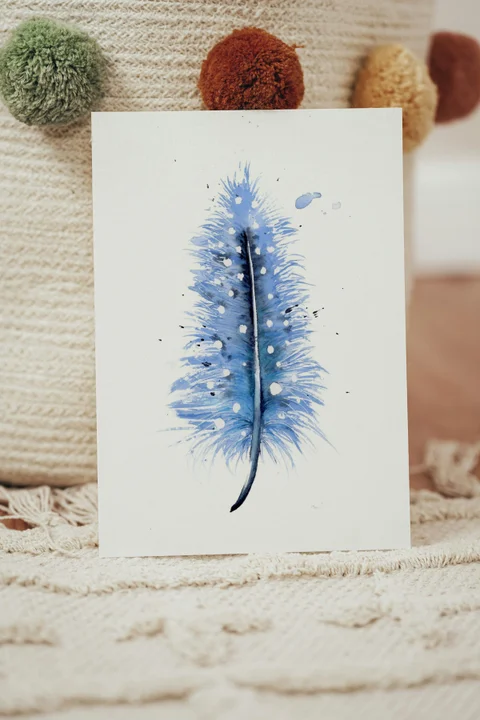 Image of a feather watercolor painting by Shayna Larsen, originals & prints available