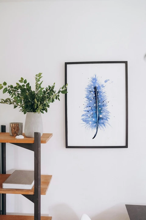 Image of a feather watercolor painting by Shayna Larsen, originals & prints available