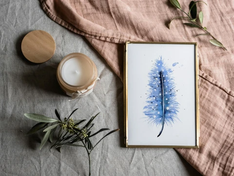 Image of a feather watercolor painting by Shayna Larsen, originals & prints available