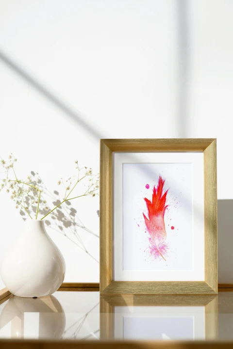 Image of a feather watercolor painting by Shayna Larsen, originals & prints available