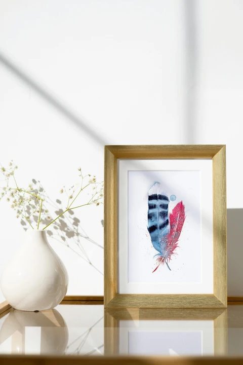 Image of a feather watercolor painting by Shayna Larsen, originals & prints available