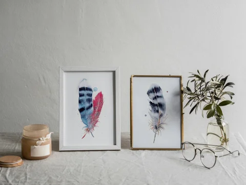 Image of a feather watercolor painting by Shayna Larsen, originals & prints available