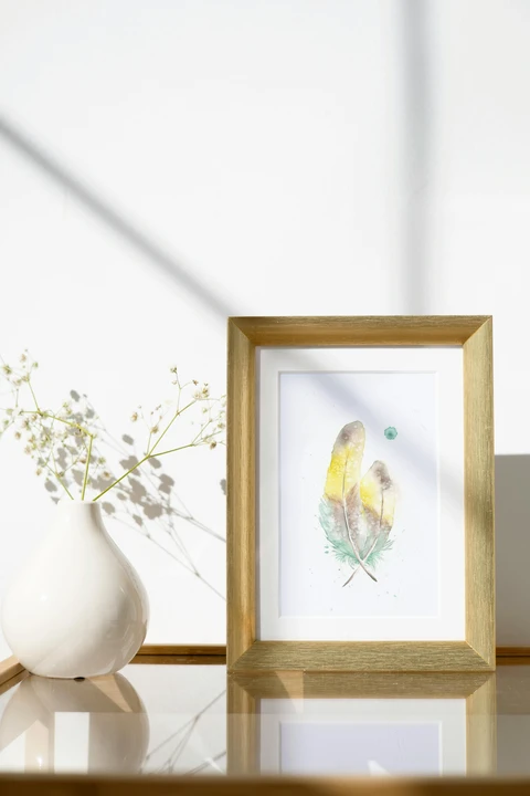 Image of a feather watercolor painting by Shayna Larsen, originals & prints available