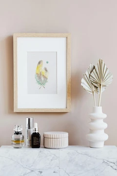 Image of a feather watercolor painting by Shayna Larsen, originals & prints available