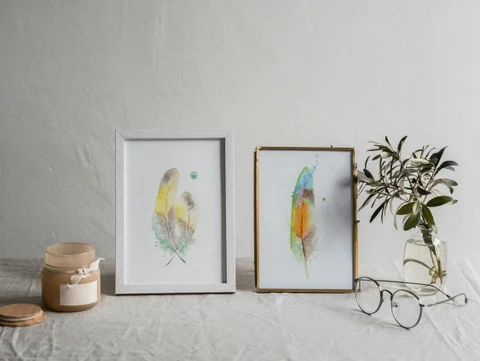 Image of a feather watercolor painting by Shayna Larsen, originals & prints available