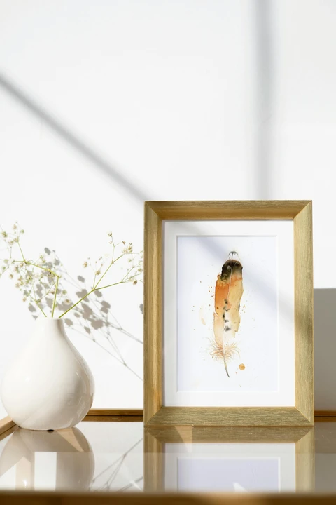 Image of a feather watercolor painting by Shayna Larsen, originals & prints available