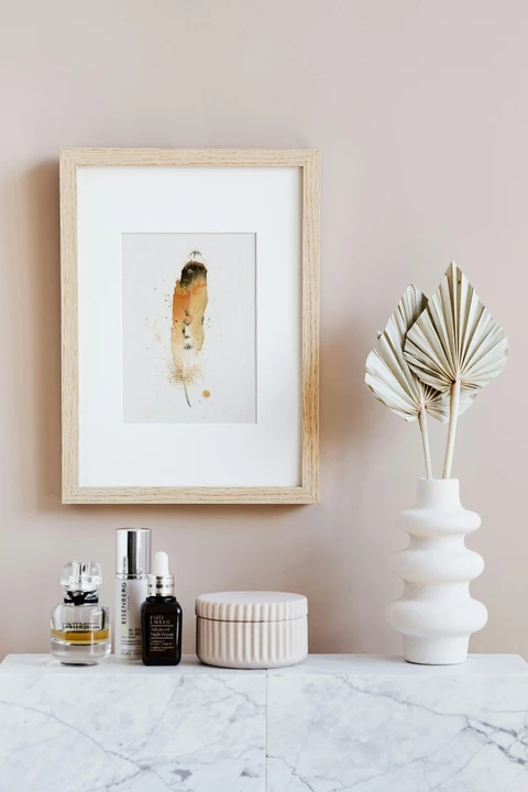 Image of a feather watercolor painting by Shayna Larsen, originals & prints available