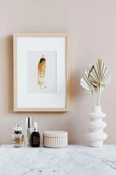Image of a feather watercolor painting by Shayna Larsen, originals & prints available