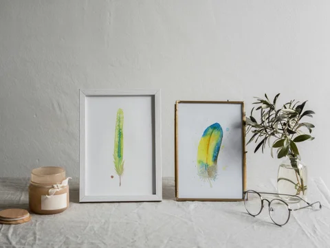 Image of a feather watercolor painting by Shayna Larsen, originals & prints available