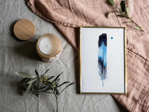 Image of a feather watercolor painting by Shayna Larsen, originals & prints available