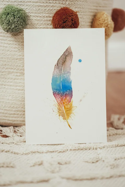 Image of a feather watercolor painting by Shayna Larsen, originals & prints available