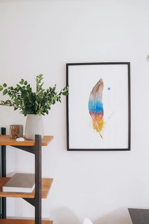 Image of a feather watercolor painting by Shayna Larsen, originals & prints available