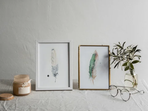 Image of a feather watercolor painting by Shayna Larsen, originals & prints available