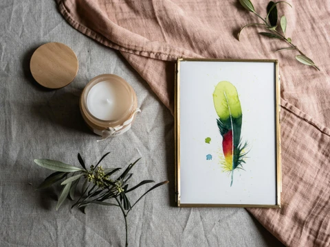 Image of a feather watercolor painting by Shayna Larsen, originals & prints available