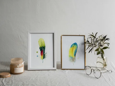 Image of a feather watercolor painting by Shayna Larsen, originals & prints available