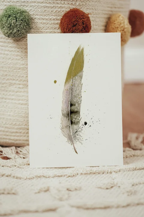 Image of a feather watercolor painting by Shayna Larsen, originals & prints available