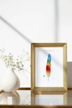 Image of a feather watercolor painting by Shayna Larsen, originals & prints available