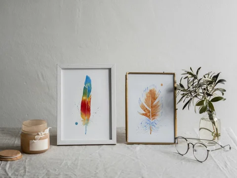 Image of a feather watercolor painting by Shayna Larsen, originals & prints available