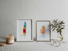 Image of a feather watercolor painting by Shayna Larsen, originals & prints available