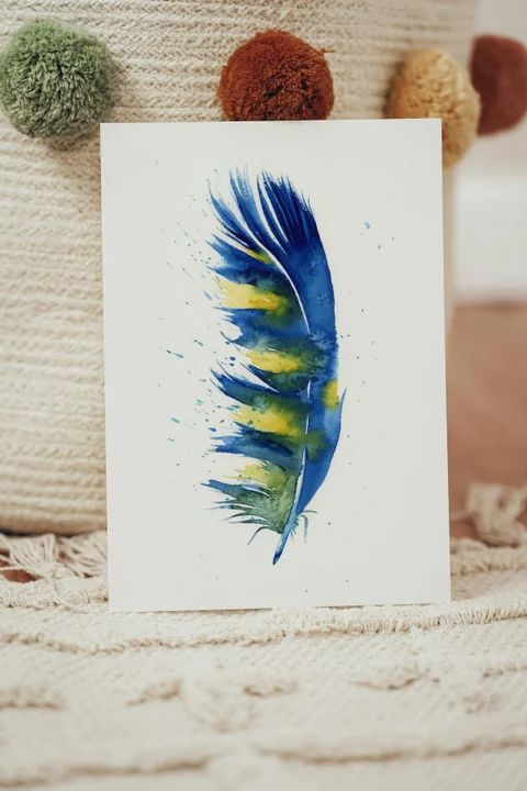 Image of a feather watercolor painting by Shayna Larsen, originals & prints available