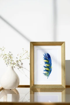 Image of a feather watercolor painting by Shayna Larsen, originals & prints available