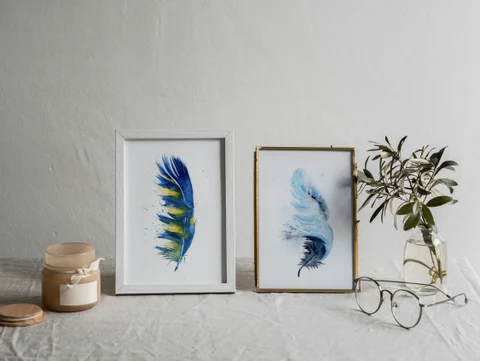 Image of a feather watercolor painting by Shayna Larsen, originals & prints available
