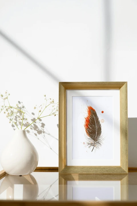 Image of a feather watercolor painting by Shayna Larsen, originals & prints available