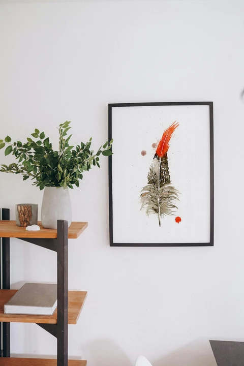 Image of a feather watercolor painting by Shayna Larsen, originals & prints available