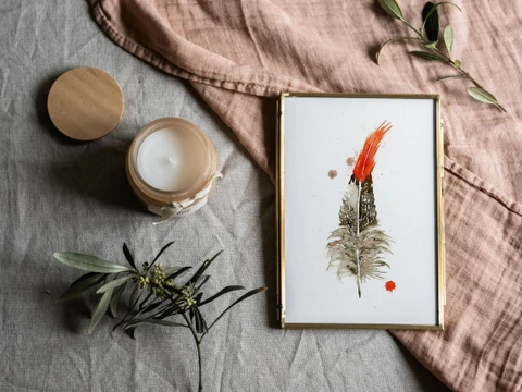 Image of a feather watercolor painting by Shayna Larsen, originals & prints available