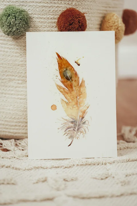 Image of a feather watercolor painting by Shayna Larsen, originals & prints available