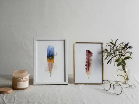 Image of a feather watercolor painting by Shayna Larsen, originals & prints available