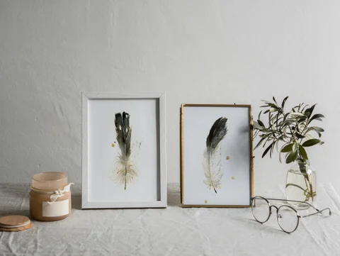 Image of a feather watercolor painting by Shayna Larsen, originals & prints available