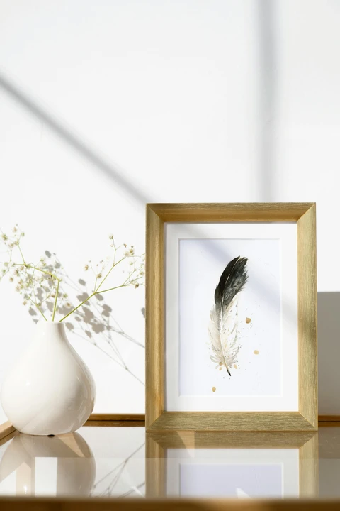 Image of a feather watercolor painting by Shayna Larsen, originals & prints available