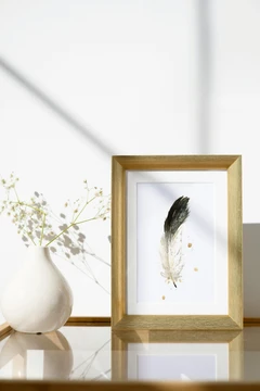 Image of a feather watercolor painting by Shayna Larsen, originals & prints available