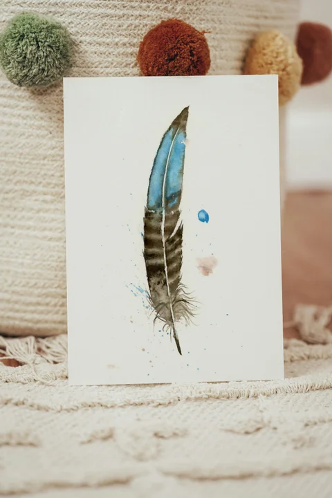 Image of a feather watercolor painting by Shayna Larsen, originals & prints available