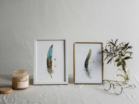 Image of a feather watercolor painting by Shayna Larsen, originals & prints available