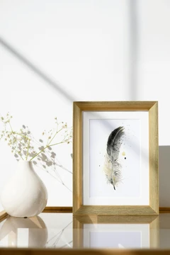 Image of a feather watercolor painting by Shayna Larsen, originals & prints available