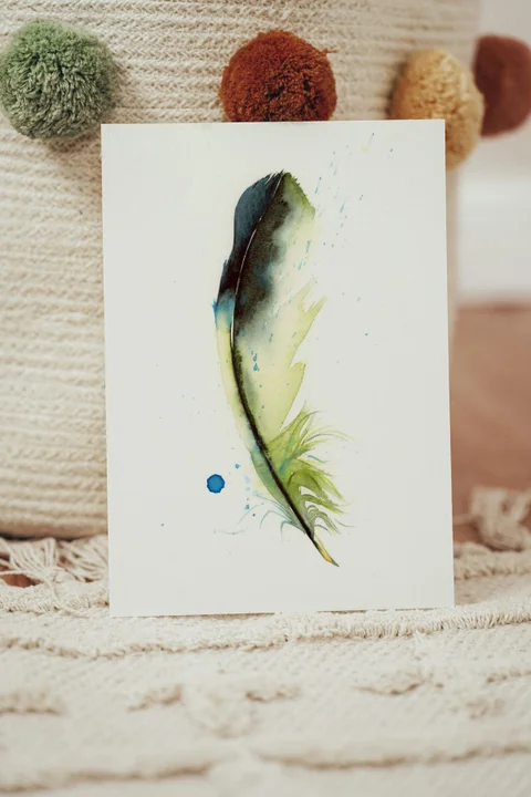 Image of a feather watercolor painting by Shayna Larsen, originals & prints available