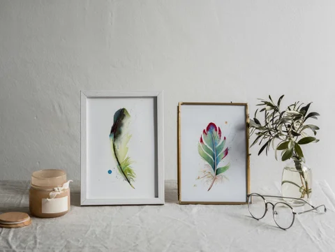 Image of a feather watercolor painting by Shayna Larsen, originals & prints available