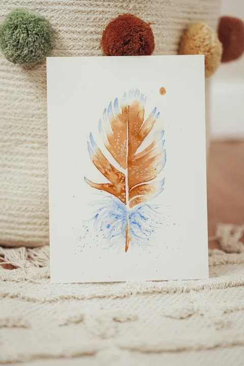 Image of a feather watercolor painting by Shayna Larsen, originals & prints available