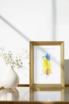 Image of a feather watercolor painting by Shayna Larsen, originals & prints available