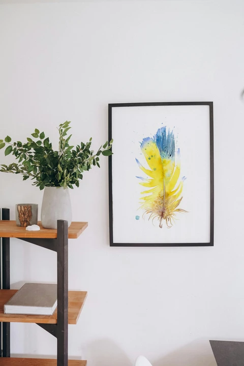 Image of a feather watercolor painting by Shayna Larsen, originals & prints available