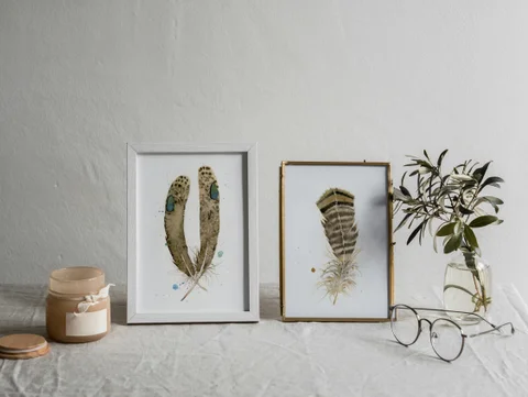 Image of a feather watercolor painting by Shayna Larsen, originals & prints available