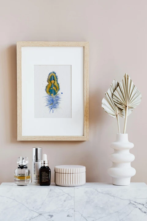 Image of a feather watercolor painting by Shayna Larsen, originals & prints available