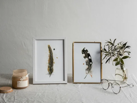 Image of a feather watercolor painting by Shayna Larsen, originals & prints available