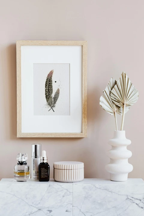 Image of a feather watercolor painting by Shayna Larsen, originals & prints available
