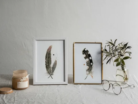 Image of a feather watercolor painting by Shayna Larsen, originals & prints available