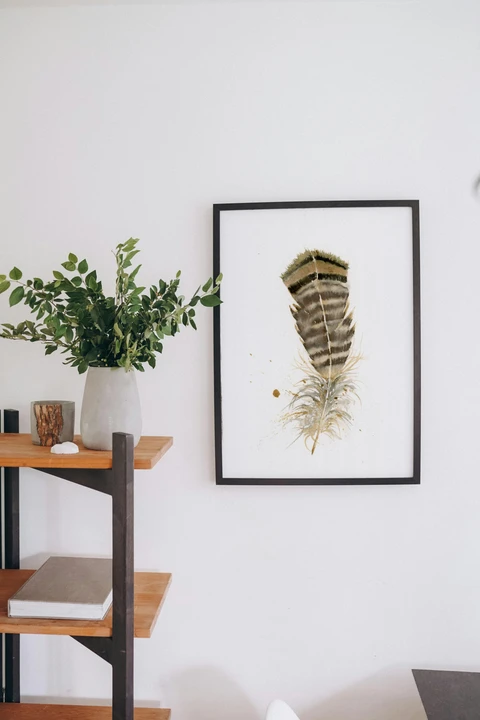 Image of a feather watercolor painting by Shayna Larsen, originals & prints available